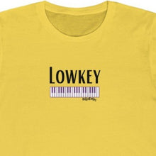 Load image into Gallery viewer, Yellow Tee shirt with Piano Keys, DillieDally logo and black wording: Lowkey