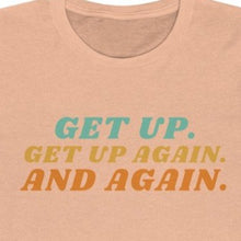 Load image into Gallery viewer, Peach Tee shirt with colorful wording: Get up, Get up again and again.
