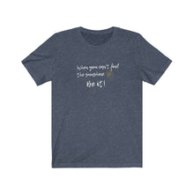 Load image into Gallery viewer, Heather Navy Tee Shirt with wording: When you can't find the sunshine, Be it and a sun pic.