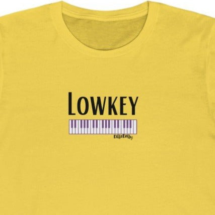 Yellow Tee shirt with Piano Keys, DillieDally logo and black wording: Lowkey